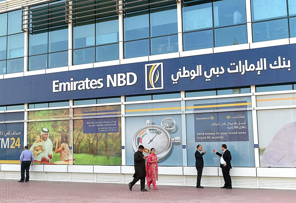 Customers outside Emirates NBD bank. Source: Arabian Business